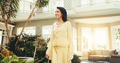 Buy stock photo Happy, woman and walk at resort for holiday, adventure and guest exploring at luxury accommodation. Smile, mature person and checkin at retreat with scenic view, travel experience and weekend getaway