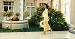 Smile, woman and walk at resort for holiday, adventure and guest exploring at luxury accommodation. Happy, mature person and checkin at retreat with scenic view, travel experience and weekend getaway