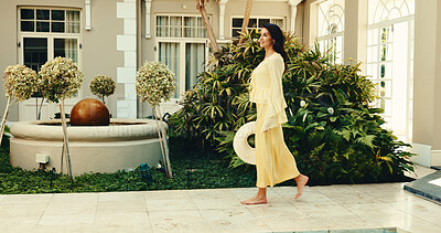 Buy stock photo Smile, woman and walk at resort for holiday, adventure and guest exploring at luxury accommodation. Happy, mature person and checkin at retreat with scenic view, travel experience and weekend getaway
