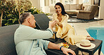 Cheers, relax and happy couple with drink in resort for holiday getaway or vacation together. Man, woman or smile with alcohol, glass or toast for weekend trip, date or honeymoon in luxury retreat