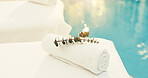 Spa, empty and towel with plant at resort for aromatherapy, beauty treatment and calm for wellness. Hospitality, background and eucalyptus for herbal scent, holistic therapy and pamper for massage