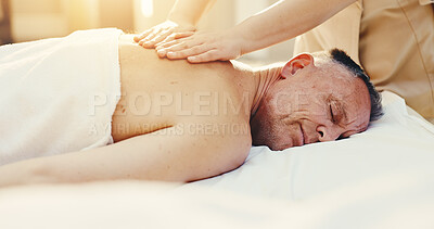 Buy stock photo Hands, man and sleeping at spa for massage, deep tissue and holistic treatment of back pain. Masseuse, mature person and dreaming at salon for self care, muscle stiffness and therapeutic for wellness