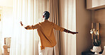 Woman, awake and stretching with morning in bedroom for holiday, weekend getaway or break in hotel. Back view, female person or waking up with curtain or sunshine for summer vacation in luxury resort