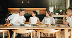 Celebration, discussion and friends in home with meal, bonding and reunion with meal together. Smile, gossip and mature people with dinner, party connection and good time with social gathering.