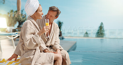 Buy stock photo Cocktail, couple and conversation at swimming pool on vacation, break and relax together on getaway. Poolside, mature man and woman with mimosa, holiday chat or outdoor at luxury spa with love
