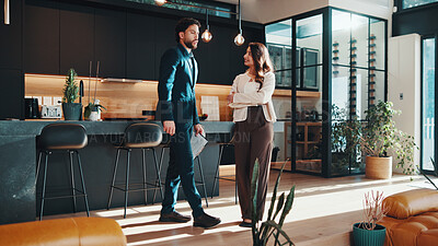 Buy stock photo Home, talking and real estate agent with client for viewing with clipboard, tour and price feedback. Realtor, happy customer and people with property investment, house hunting or budget negotiation