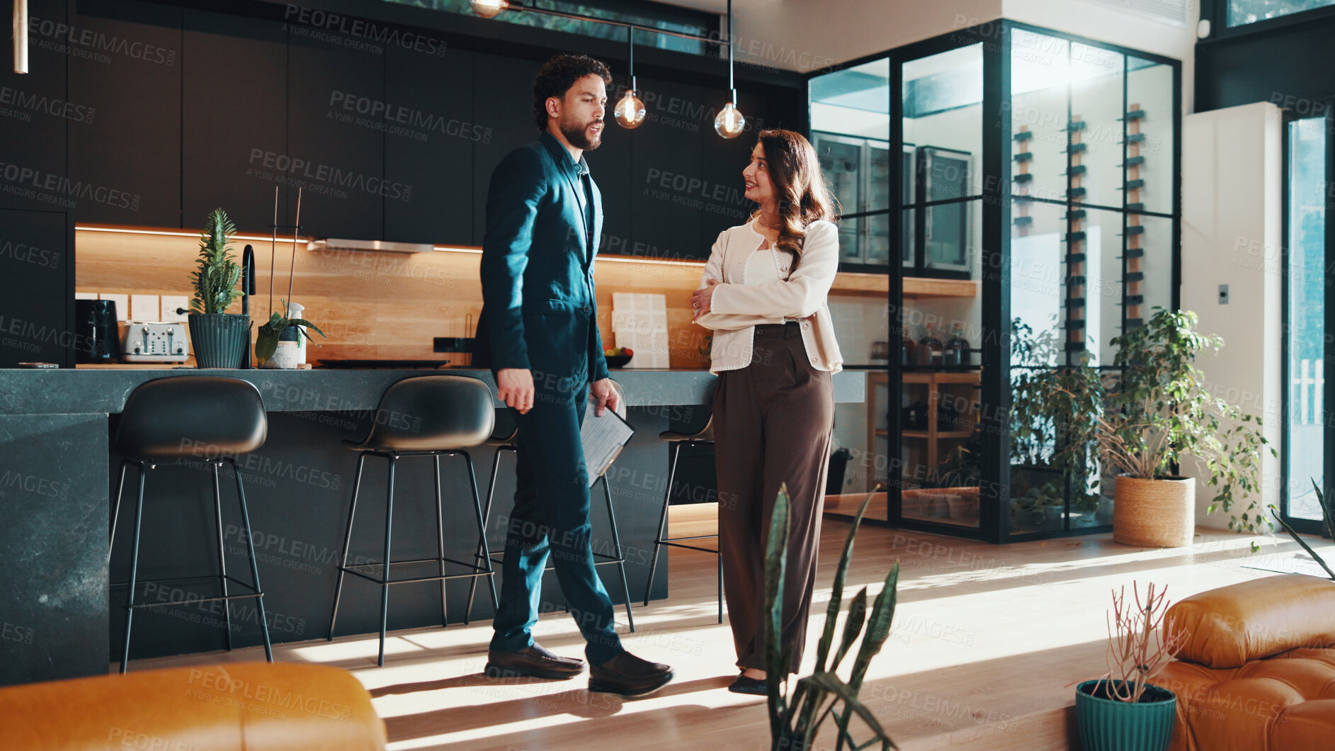 Buy stock photo Home, talking and real estate agent with client for viewing with clipboard, tour and price feedback. Realtor, happy customer and people with property investment, house hunting or budget negotiation