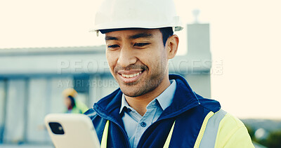 Buy stock photo Man, engineer and phone at site for construction, research and email client for architecture design. Smile, person and reading outdoor with mobile, online blueprint and inspection report for project