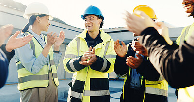 Buy stock photo Happy, engineer and team at construction site with applause, property development success and goals. People, supervisor and building group clap outdoor with celebration, smile or engineering approval