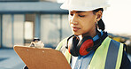 Woman, architect or checklist with clipboard for building inspection or safety on construction site. Female person, contractor or civil engineer taking notes for architecture project or security