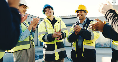 Buy stock photo Happy, team and clap on site with construction worker, property development progress or achievement. People, electrician and builder outdoor with celebration, applause and good news from supervisor.
