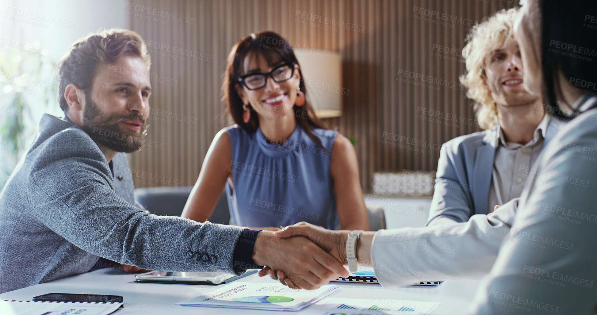 Buy stock photo Happy, meeting or businessman with handshake for agreement, partnership or hiring in office. Male person, employees or colleagues shaking hands with smile for recruiting or career onboarding together