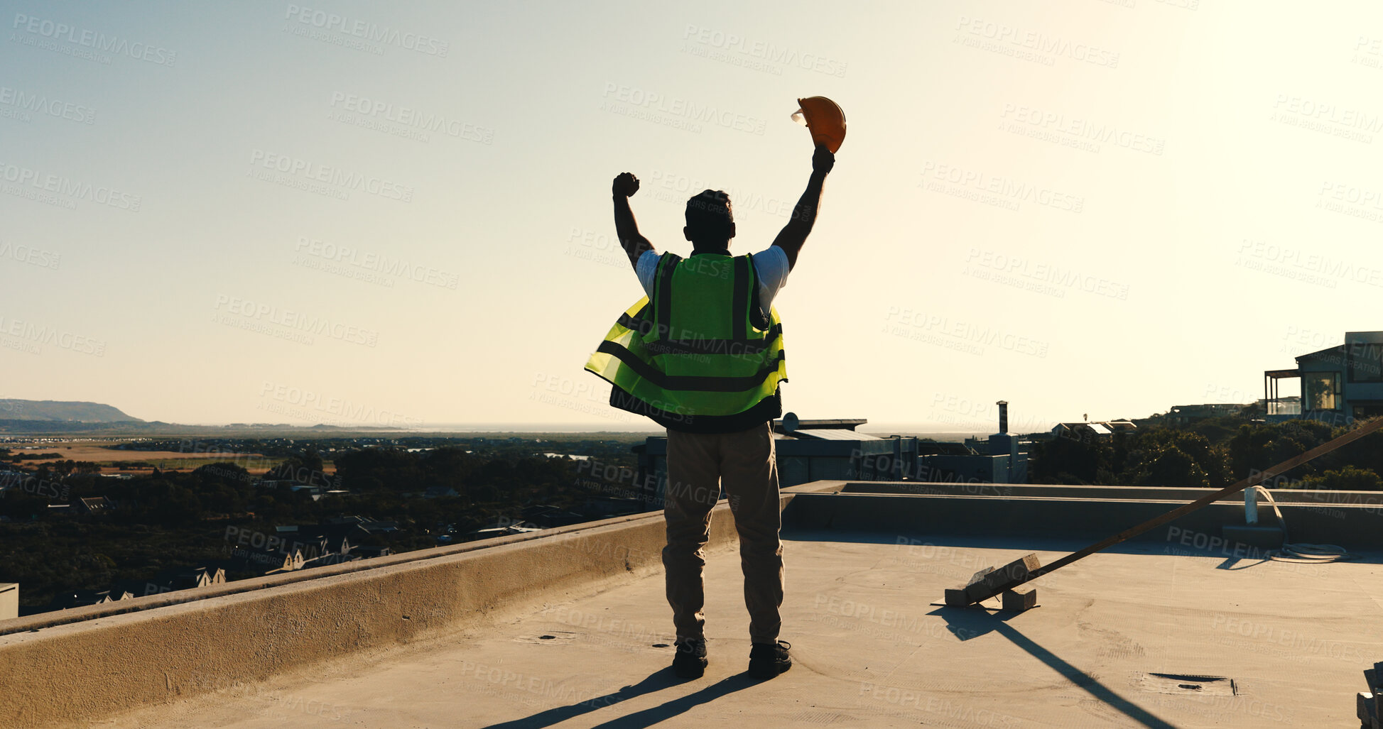 Buy stock photo Back, engineer and fist pump at site for construction, good news and foundation success of project. Space, man or raised hands on rooftop for celebration, pass inspection and architecture achievement