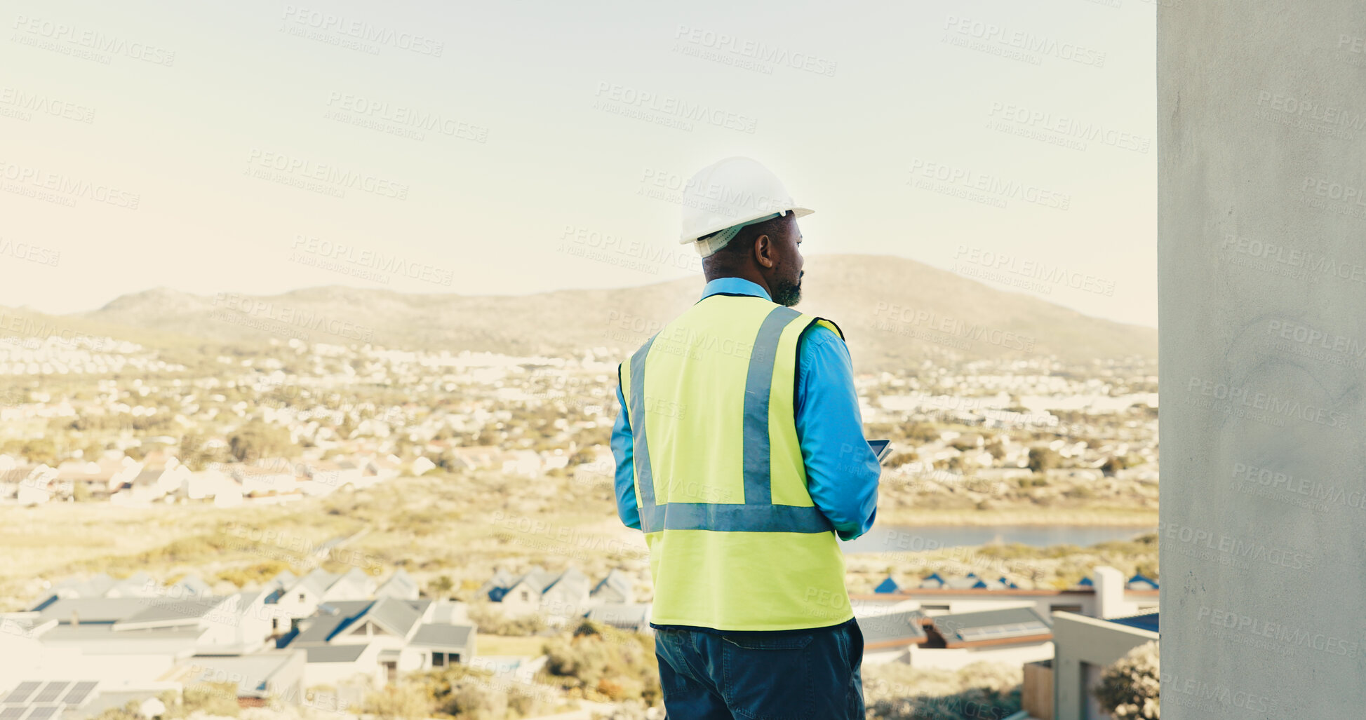Buy stock photo Architect, man and inspection on construction site for building, safety regulations or tablet. Male person, space and civil engineer with tech for infrastructure, architecture project or security