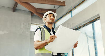 Buy stock photo Engineer, man and blueprint on construction site for inspection, safety regulations or building. Property, architect and low angle with document for infrastructure, renovation project and compliance