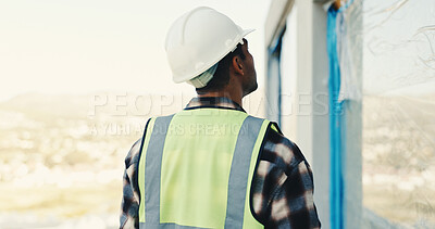 Buy stock photo Architect, man and inspection on construction site for renovation, building or safety regulations. Male person, back and civil engineer with check for infrastructure, architecture project or security