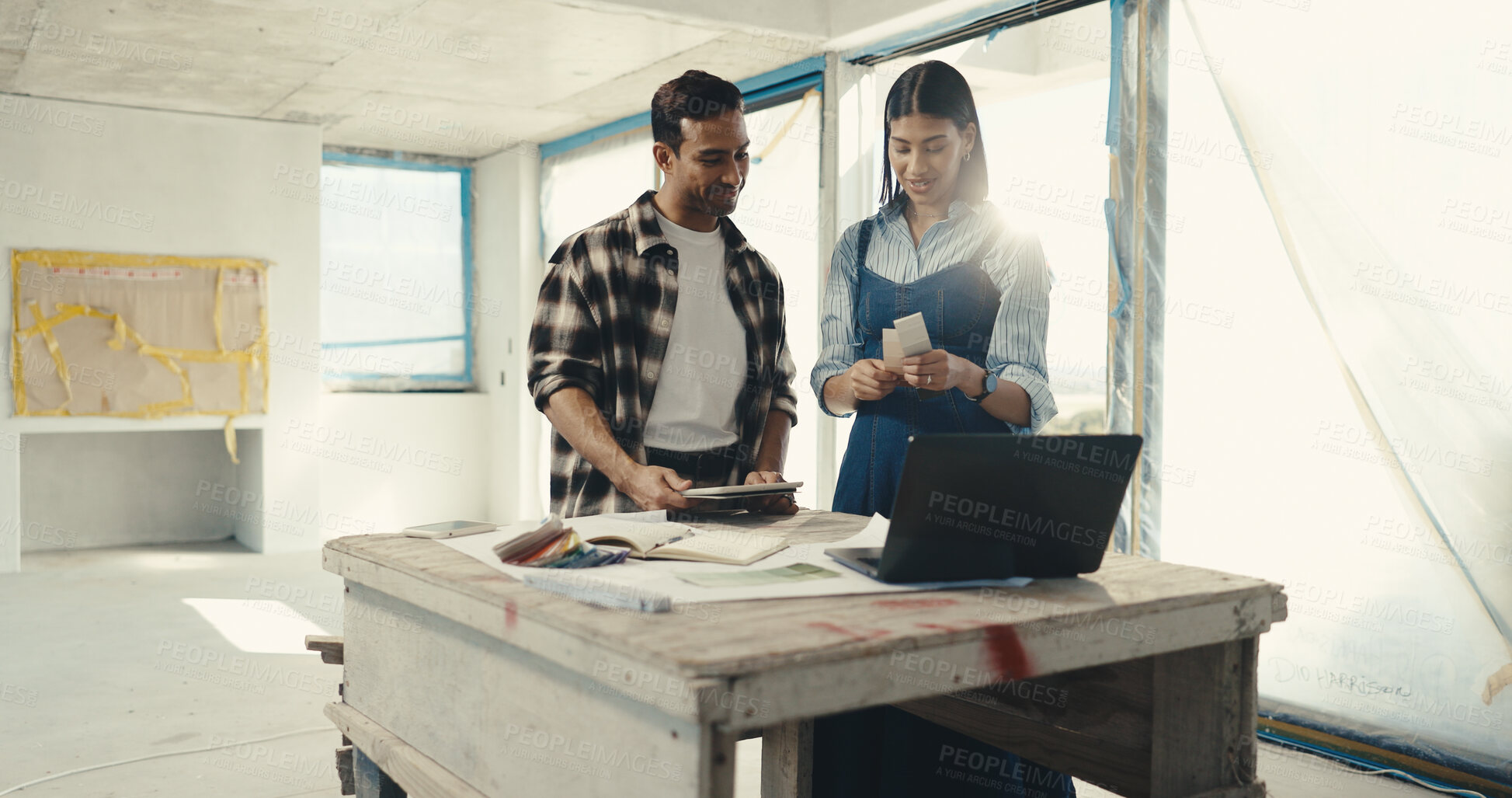 Buy stock photo Smile, couple and swatch at house for renovation, paint sample and color selection for makeover. Happy, people and laptop in home with palette, options and interior design for property refurbishment