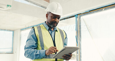 Buy stock photo Architect, black man and tablet on construction site for inspection, safety regulations or building. Mature person, engineer and check with tech for infrastructure, renovation project or security
