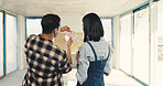 Back, couple and swatch at house for renovation, paint sample and color selection for makeover. People, talk and palette in home with options, comparison and interior design of property refurbishment