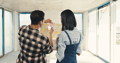 Buy stock photo Back, couple and swatch at house for renovation, paint sample and color selection for makeover. People, talk and palette in home with options, comparison and interior design of property refurbishment