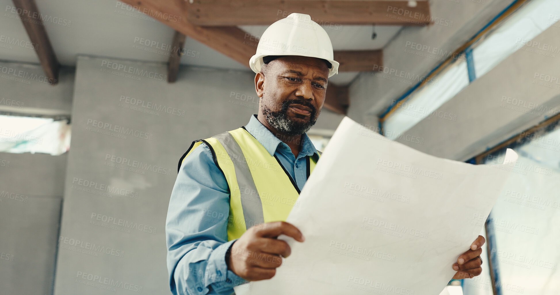 Buy stock photo Engineer, black man and confused with blueprint on construction site for building inspection. Mature person, architect and low angle with document for infrastructure, renovation and compliance issue