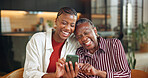 Senior mother, laugh and woman with phone in house, entertainment and watching video with daughter. Family, online and bonding with elderly parent, happy and black people with mobile for funny film