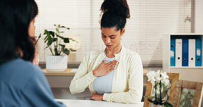 Buy stock photo Woman, doctor and patient with chest pain for healthcare advice, consultation or checkup in office. Female person, client or talking with medical health worker for asthma, illness or discomfort