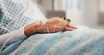 Hand, IV drip and person in hospital bed for healthcare, rehabilitation or treatment as ICU patient. Infusion, resting and saline with senior woman in clinic for healing or post surgery recovery
