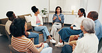 Psychologist, talk and therapy in clinic with support group, wellness tips and guidance for healing. Therapist, people and discussion in meeting with help, psychology and advice for mental health.