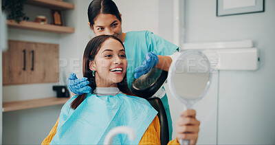 Buy stock photo Women, dentist and mirror with patient for smile, oral care or treatment options in clinic. Hygiene, support and people with consultation for root canal, dental surgery or tooth whitening in office