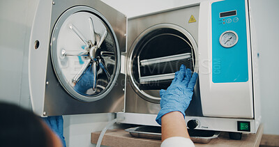 Buy stock photo Hands, heathcare and steam sterilizer in clinic for removal of bacteria, fungi and virus from sample. Gloves, medicine and technology with person operating autoclave in laboratory for decontamination