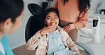 Happy, smile and dentist with child for appointment, consulting and success for oral care. Healthcare, orthodontist and girl with mom for dental hygiene, teeth cleaning and learning gum wellness