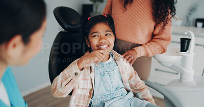 Buy stock photo Happy, smile and dentist with child for appointment, consulting and success for oral care. Healthcare, orthodontist and girl with mom for dental hygiene, teeth cleaning and learning gum wellness