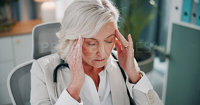 Buy stock photo Doctor, stress or headache in office for work strain, mental health and overwhelmed with workload. Mature woman, healthcare worker and burnout or doubt for deadline, fatigue or tired with vertigo