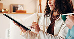 Coffee, hands and tablet with couple on sofa in home for digital finance or Internet banking. App, drink and household budget with people in living room to review investment account or portfolio