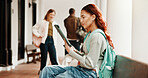 Student, woman and reading at college with tablet, digital learning platform and ebook for education. Person, browsing and outdoor on campus with tech, app and online textbook for university course.