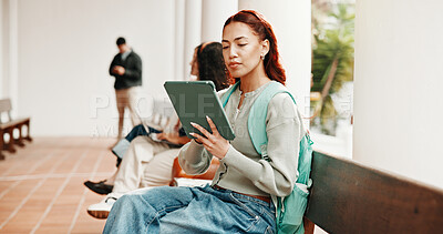 Buy stock photo Student, woman and reading at university with tablet, learning platform and ebook for english degree. Person, browsing and outdoor on campus with tech, app and online textbook for college education.