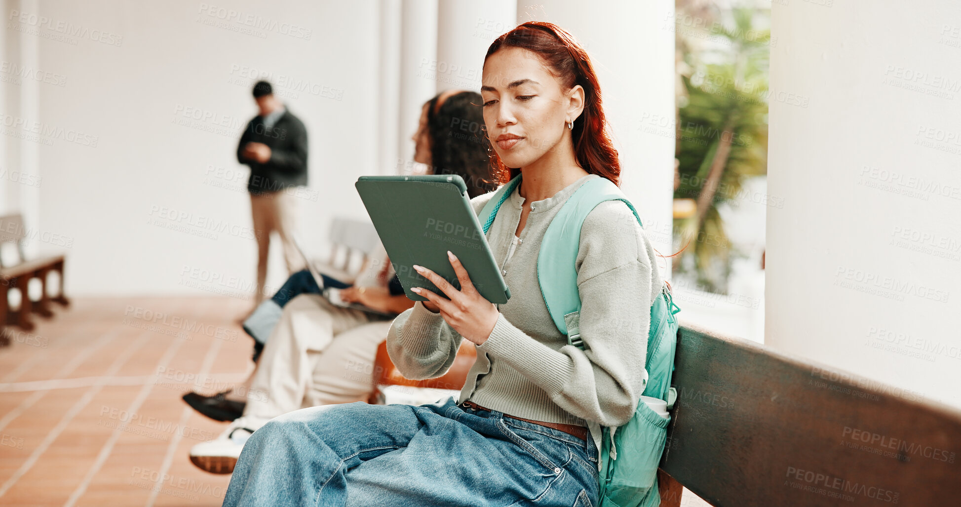Buy stock photo Student, woman and reading at university with tablet, learning platform and ebook for english degree. Person, browsing and outdoor on campus with tech, app and online textbook for college education.