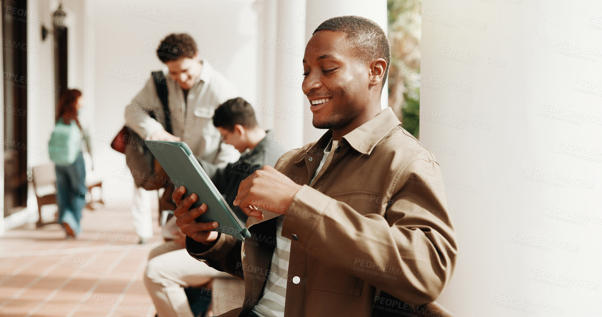Buy stock photo Happy, student and man at college with tablet, check registration status and online schedule on app. Space, person and browse outdoor on campus with tech, website and enrollment on university portal.