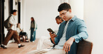 Student, man and online at college with phone, higher education or search for scholarship on website. Person, typing and outdoor on campus with tech, glasses or browse internet for university grant.