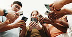 Hands, friends and phone for connection outdoor, share contact or networking on social media. Group, people or low angle with mobile for communication together, download community app or text message