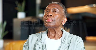 Buy stock photo Black woman, breath and retirement at house for meditation, holistic balance or spiritual healing. Senior person, exhale or eyes closed in home with breathwork, inner peace and self care for wellness