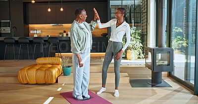 Buy stock photo Fitness, old woman or coach in house with high five, wellness session or success in exercise. Happy, instructor or African people with well done, training together or elderly workout in retirement.