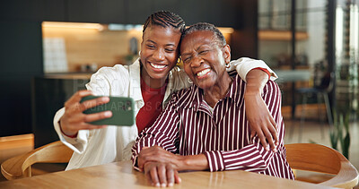 Buy stock photo Home, senior mother and selfie with woman, love and hug with happy black family for bonding together. Photo, elderly parent and adult daughter embrace for social media memory, care and support