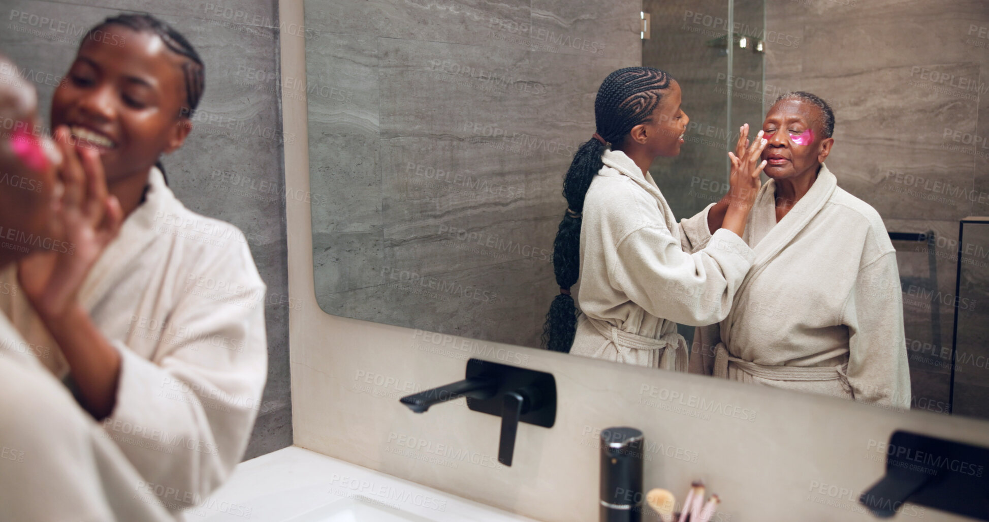 Buy stock photo Bathroom, woman and senior mom for eye mask, skincare and treatment together for bonding. Family, mirror and African daughter, mother and cosmetics for skin hydration, self care and beauty in home