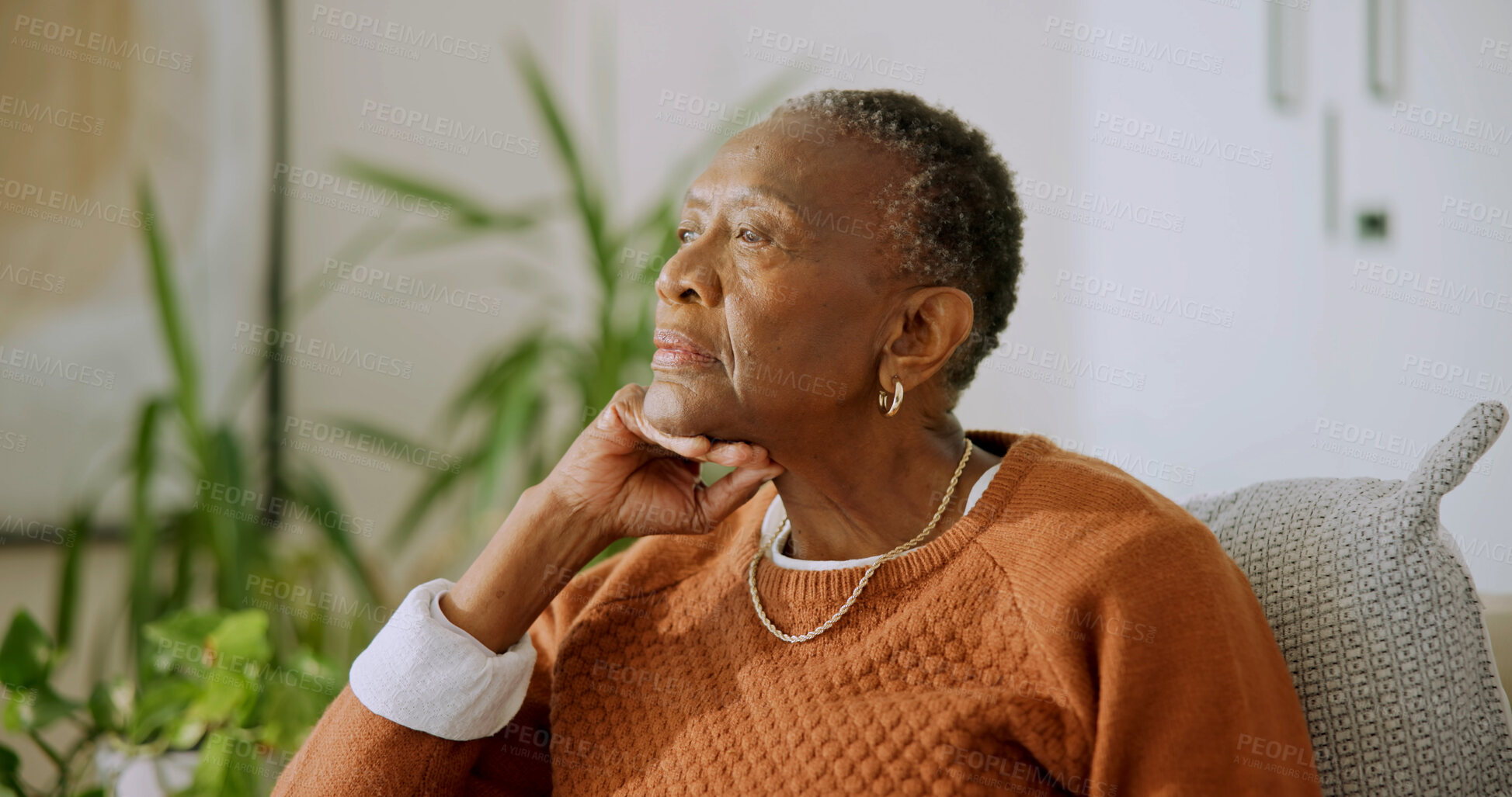 Buy stock photo Senior, woman and relax in home with thinking, quiet introspection or peaceful solitude on sofa. Elderly, black person and serious in house for retirement reflection, nostalgic memory or calm morning