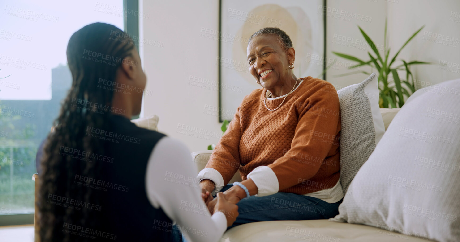 Buy stock photo Old woman, bonding and holding hands with caregiver in nursing home, comfort and gratitude for help. Assisted living, nurse and support for senior black person, healthcare and happy patient in lounge
