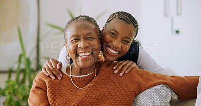 Buy stock photo Senior, mother and daughter with portrait in home, support and smile with bonding in lounge. African woman, parent and comfort with care and quality time, loving relationship and happy together