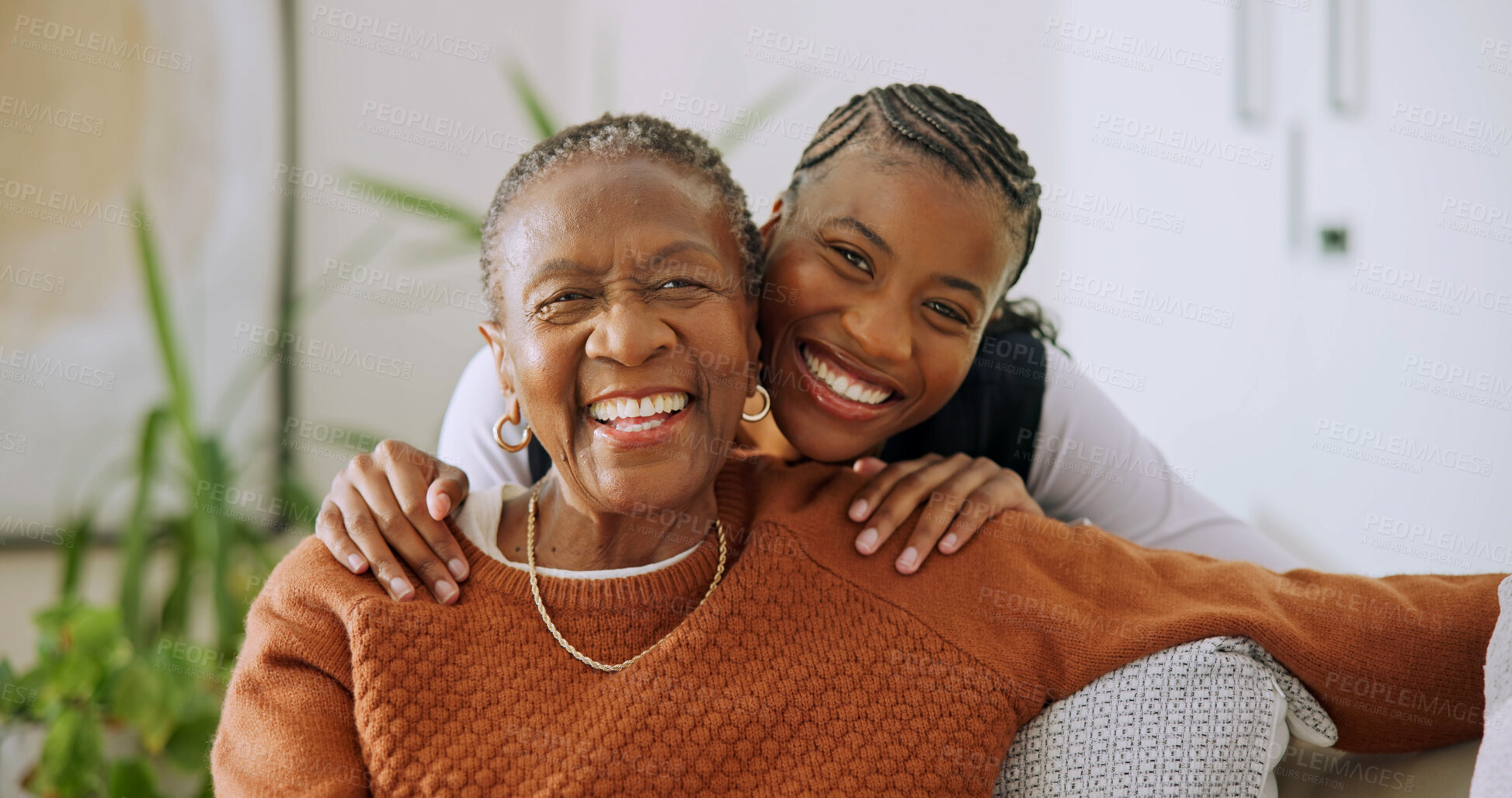Buy stock photo Senior, mother and daughter with portrait in home, support and smile with bonding in lounge. African woman, parent and comfort with care and quality time, loving relationship and happy together