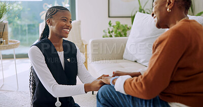 Buy stock photo Happy, old woman and holding hands with caregiver in nursing home, connection or gratitude for help. Assisted living, nurse and support for senior black person, healthcare and patient in lounge